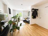Wohnzimmer mit Zugang Balkon - Moderne provisionsfreie 2-Zimmer-Wohnung in Fürth im jungen Neubau