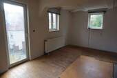 Wohnzimmer EG.JPG - 1 Zimmer Mehrfamilienhaus, Wohnhaus in Homberg