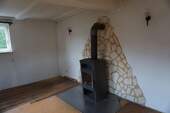Ofen Wohnzimmer EG.JPG - Mehrfamilienhaus, Wohnhaus mit 179,60 m&sup2; in Homberg zum Kaufen