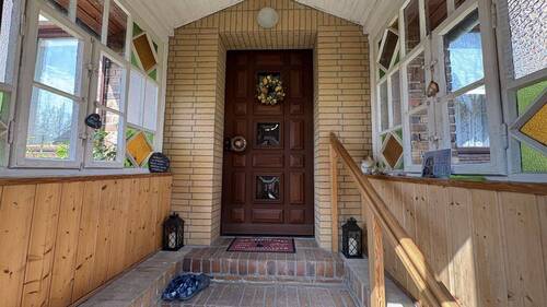 überdachte Veranda mit Zugang zum Haus - 