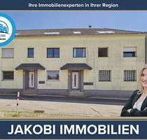 Zülpich: 5-Parteien Wohnhaus mit großer Doppelgarage sowie weiterem Ausbaupotenzial!