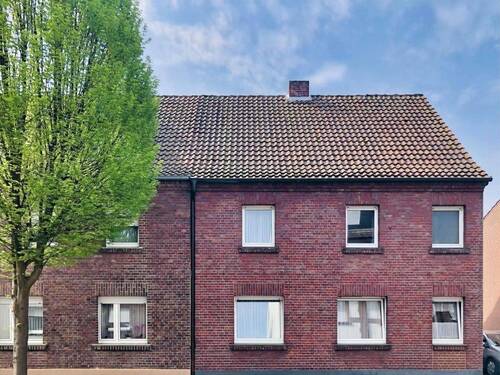 Straßenansicht - Doppelhaushälfte mit großem Potential in zentraler Stadtlage von Dülmen