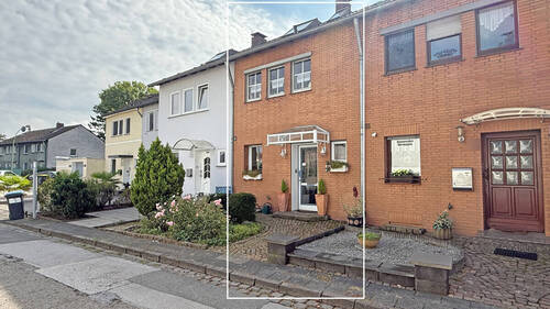Außenansicht - Attraktives Reihenmittelhaus mit Anbau in ruhiger Wohnlage von Duisburg-Homberg In den Haesen!