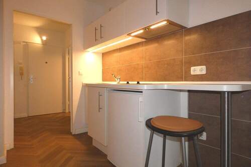 Der offene Koch- und Essbereich - 2 Zimmer Etagenwohnung zum Kaufen in Hamburg