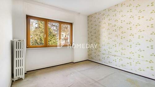 1. OG Schlafzimmer 1 - 