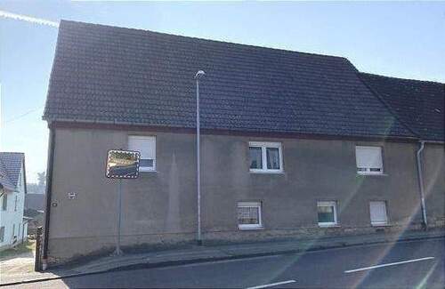 Außenansicht - Mehrfamilienhaus mit Nebengebäude und Garten in Langeneichstädt