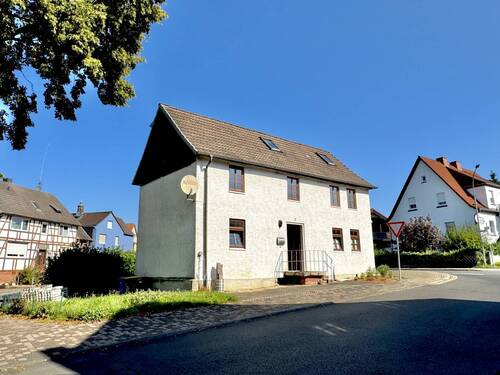 Vorder- Seitenansicht - 4 Zimmer Einfamilienhaus zum Kaufen in Borken