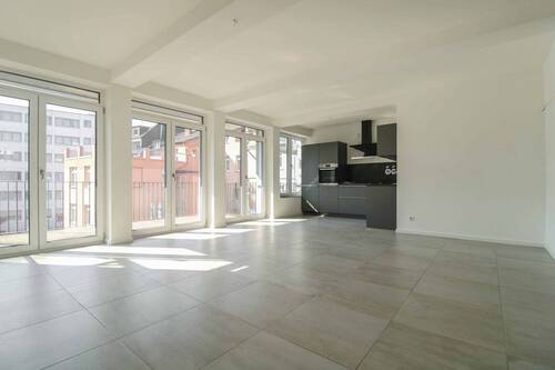 01_Wohnzimmer - Exklusive 3-Zimmer-Eigentumswohnung mit hochwertiger Ausstattung, großem Balkon und Aufzug in Essen