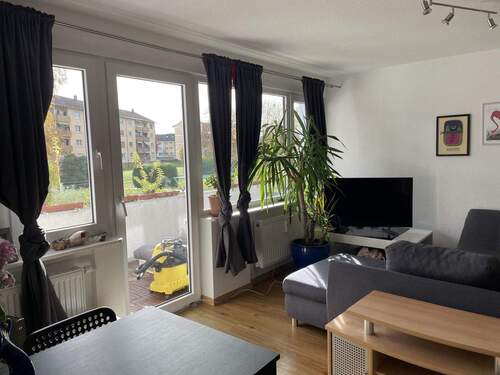 Wohnzimmer mit Zugang zur... - Etagenwohnung mit 53,00 m&sup2; in Offenburg zum Kaufen