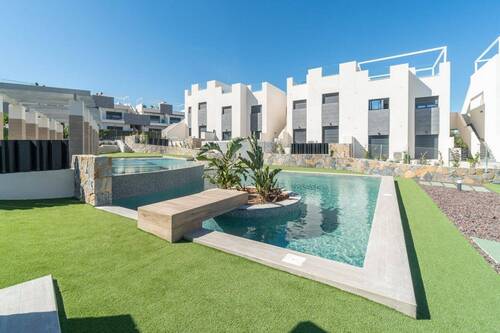 Bild 1 - Neubau-Apartment mit Garten und Gemeinschaftspool