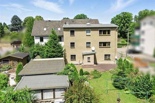 Hausansicht Gartenseite - Charmantes Einfamilienhaus mit großem Garten, Garage & Gartenlaube - schön Wohnen im Grünen von Chemnitz-Wittgensdorf!