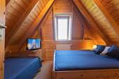 Schlafzimmer mit Doppel-/Einzelbett OG - 