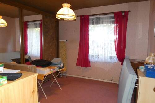 Ein Schlafzimmer mit Gartenblick - 