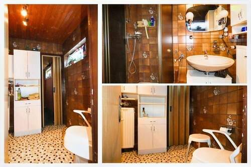 Praktisches Bad mit Dusche und Fenster - 