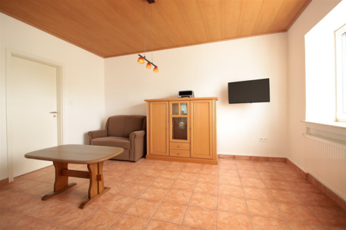 Wohnzimmer 1 EG - 9 Zimmer Einfamilienhaus in Stemwede