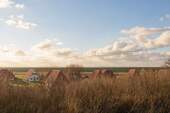 Weitblick über den Deich vom Dachgeschoss - (KI generiert) - Etagenwohnung mit 58,00 m&sup2; in Wurster Nordseeküste zum Kaufen