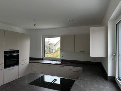 Einbauküche - Exklusive 3 Zimmer EG-Wohnung mit Terrasse, Einbauküche und PKW-Stellplätzen