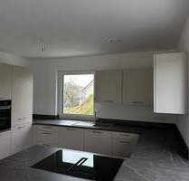 Exklusive 3 Zimmer EG-Wohnung mit Terrasse, Einbauküche und PKW-Stellplätzen - Eichstetten