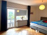 Schlafzimmer mit Balkon - 