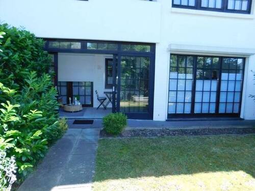 Garten mit Blick zum Wintergarten - 