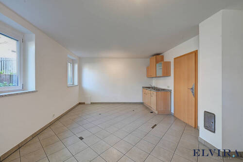 Appartement (1) mit Einbauküche im Untergeschoss - 