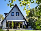 Ansicht vom Garten - Einfamilienhaus mit 98,40 m&sup2; in Buchholz zum Kaufen