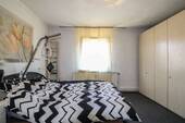 Schlafzimmer - Mehrfamilienhaus, Wohnhaus mit 221,00 m² in Ahausen zum Kaufen