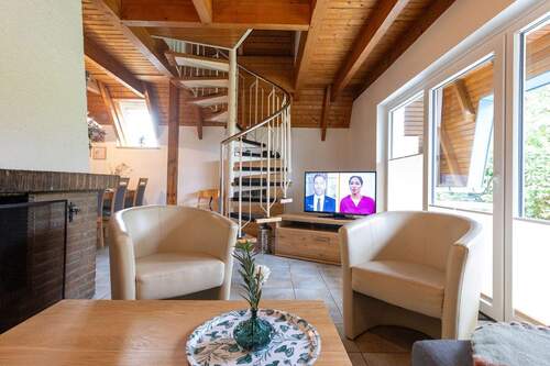 Wohnzimmer - Mehrfamilienhaus, Wohnhaus mit 66,10 m&sup2; in Wurster Nordseeküste zum Kaufen