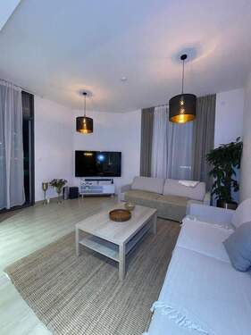 Bild 1 - Geräumiges Apartment mit 3 Schlafzimmern in zentraler Lage - Modernes, großzügiges Layout!