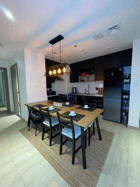Bild 2 - 4 Zimmer Etagenwohnung zum Kaufen in Dubai
