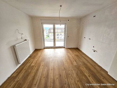 Küche mit Zugang Terrasse - Etagenwohnung mit 98,00 m² in Tawern zum Kaufen