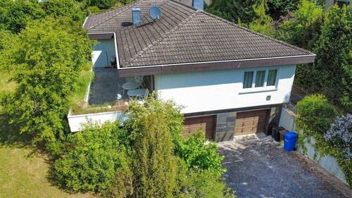 Südseite mit Doppelgarage - Einfamilienhaus mit 220,00 m² in Marktheidenfeld zum Kaufen