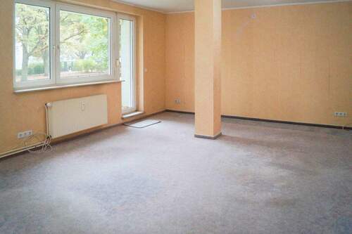 Wohnzimmer - 4 Zimmer Einfamilienhaus zum Kaufen in Bremen