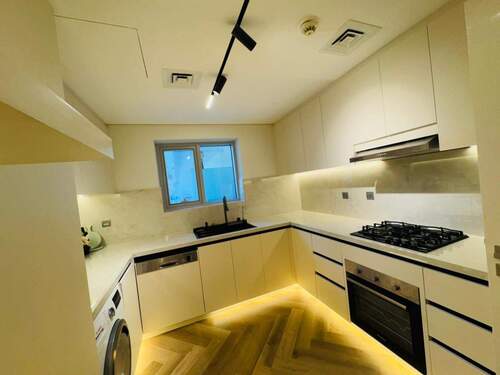 Bild 2 - 4 Zimmer Etagenwohnung zum Kaufen in Dubai