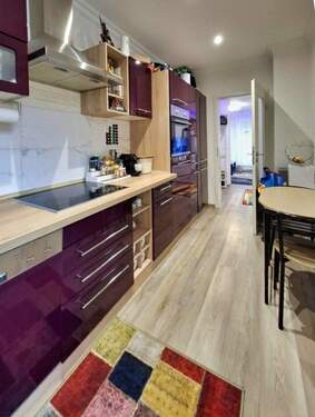 Küche mit Frühstückstisch - Etagenwohnung mit 70,00 m² in Wiesbaden zum Kaufen
