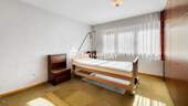 1. OG Schlafzimmer 1 - 