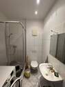 Gäste-WC mit Dusche und Waschmaschinenanschluss - 