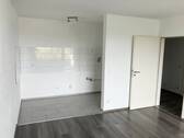 offener Küchenbereich im Wohnzimmer - 2 Zimmer Etagenwohnung in Essen