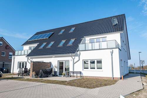 Hinteransicht - Hochwertiges Wohnen Am Wohnpark Hamfeld - 3-Zimmer-OG-Wohnung mit Stil