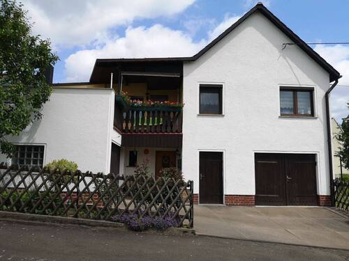 Hausansicht - Einfamilienhaus mit 100,00 m² in Königshain-Wiederau zum Kaufen