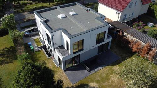 Bild 1 - Attraktive Doppelhaushälfte mit zusätzlicher Einliegerwohnung