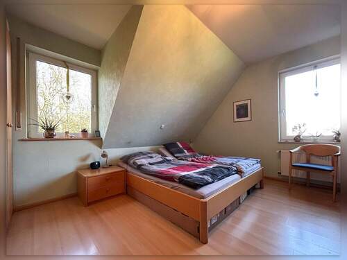 Schlafzimmer im Dachgeschoss - 