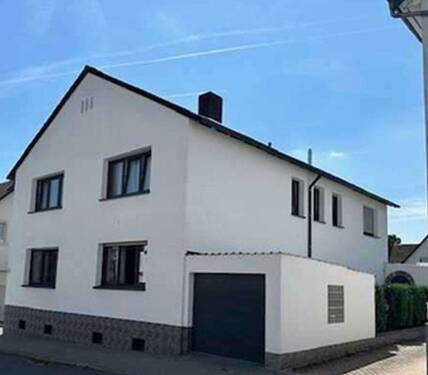 Bild 1 - Attraktives Mehrfamilienhaus mit Pool in einer ruhigen zentralen Lage von Friedrichsdorf.