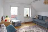 Wohnzimmer im Anbau (OG) - Mehrfamilienhaus, Wohnhaus mit 220,00 m&sup2; in Bayreuth zum Kaufen