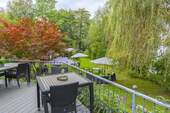 Terrasse mit Gartenpanorama und Seeblick - 