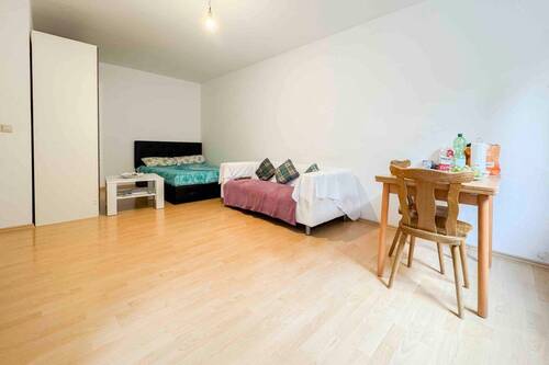 Wohnzimmer - 1 Zimmer Etagenwohnung in Nürnberg