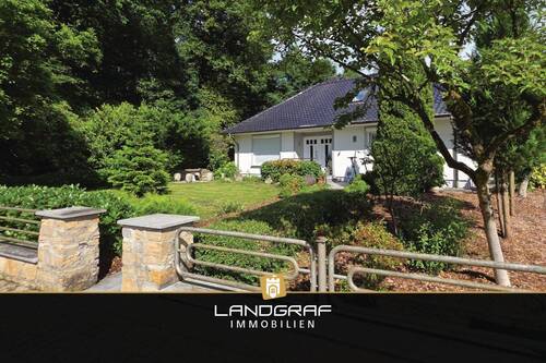 Einfamilien-Bungalow - Naturnah wohnen: Einfamilien-Bungalow mit Sauna, Keller und Doppel-Tiefgarage!