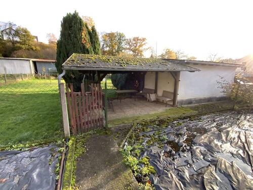 Unterstand mit Werkstatt - Einfamilienhaus mit 116,00 m&sup2; in Waldsolms zum Kaufen