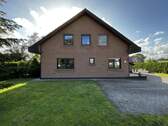 Straßenansicht - 8 Zimmer Einfamilienhaus zum Kaufen in Saterland