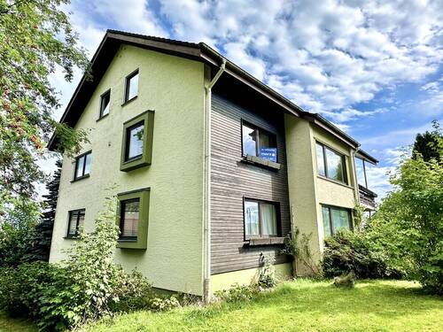 Ansicht mit Garten - Attraktives Mehrfamilienhaus: Ruhe und Natur vor der Haustür